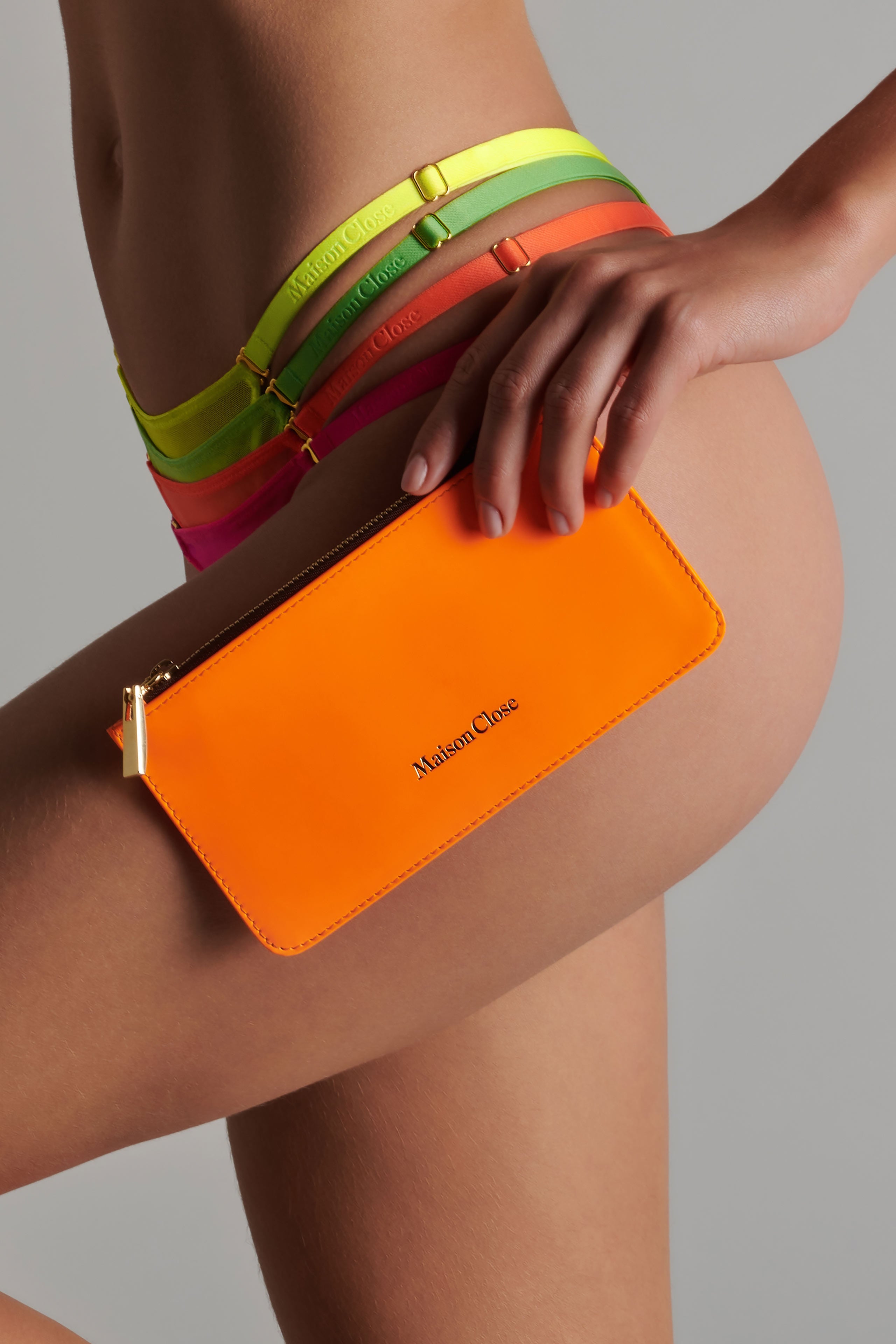 leder-clutch-neonorange-maison-close